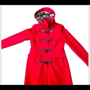 Tommy Hilfiger woman’s toggle coat. Beautiful leather accents with toggle’s.